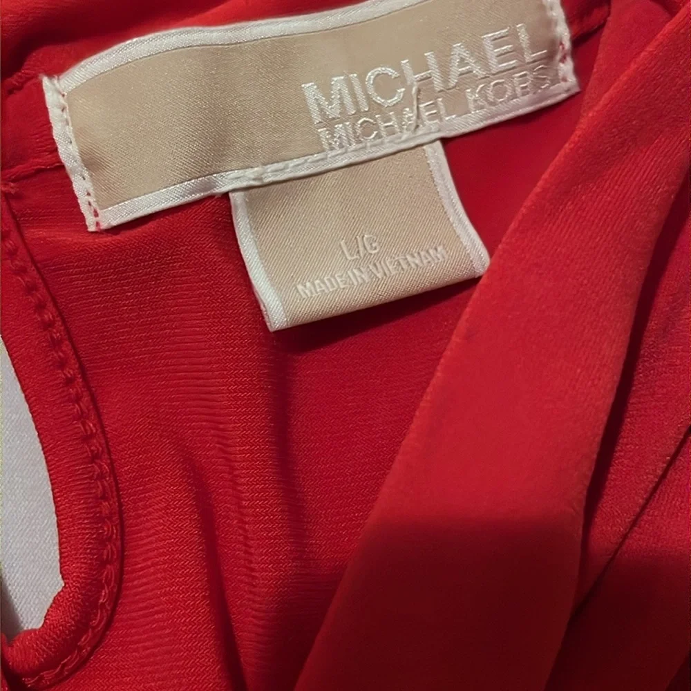 Micheal Kors size Large cherry red sleeveless top key hole back oversized